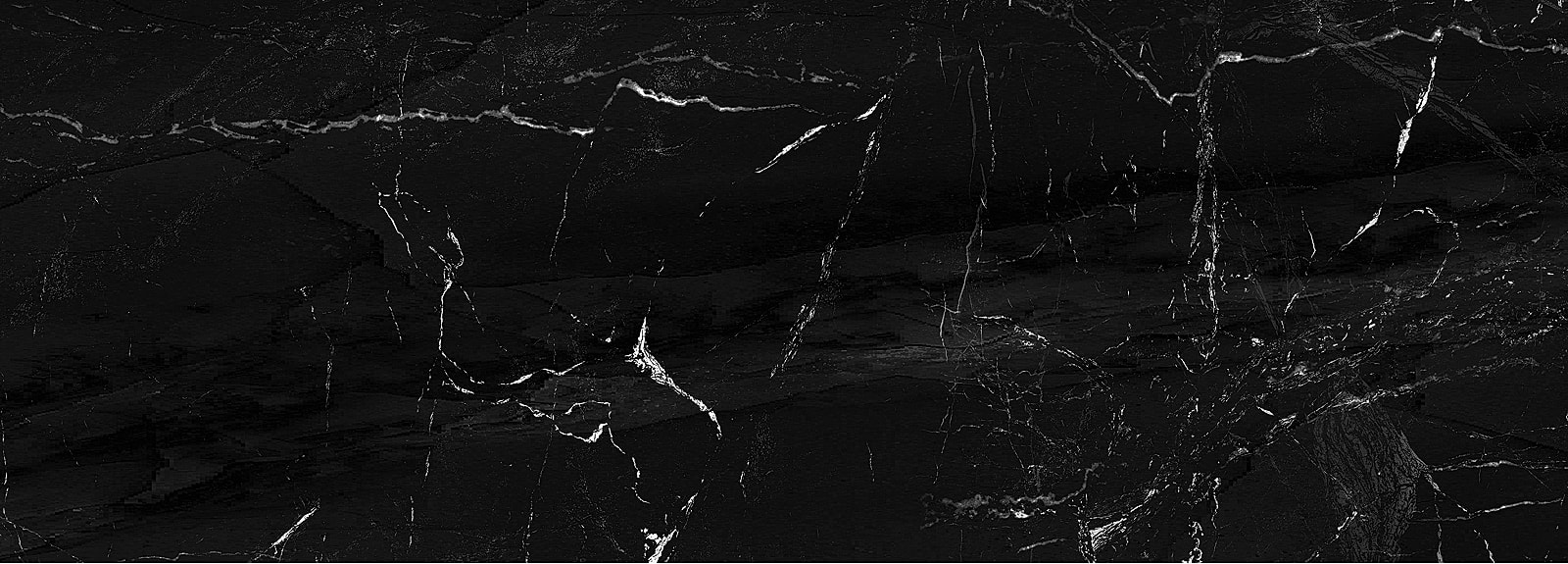 Black marble with white veining texture background.
